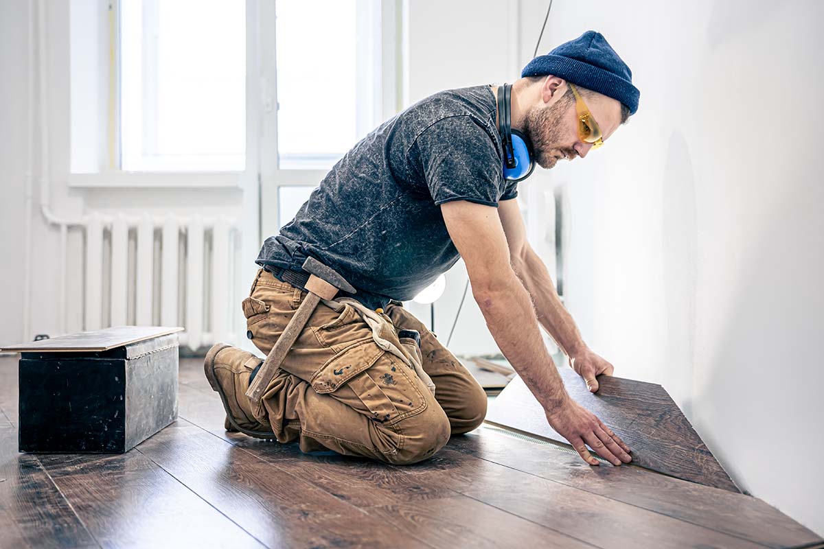 home renovation contractor in surrey working on floor installation