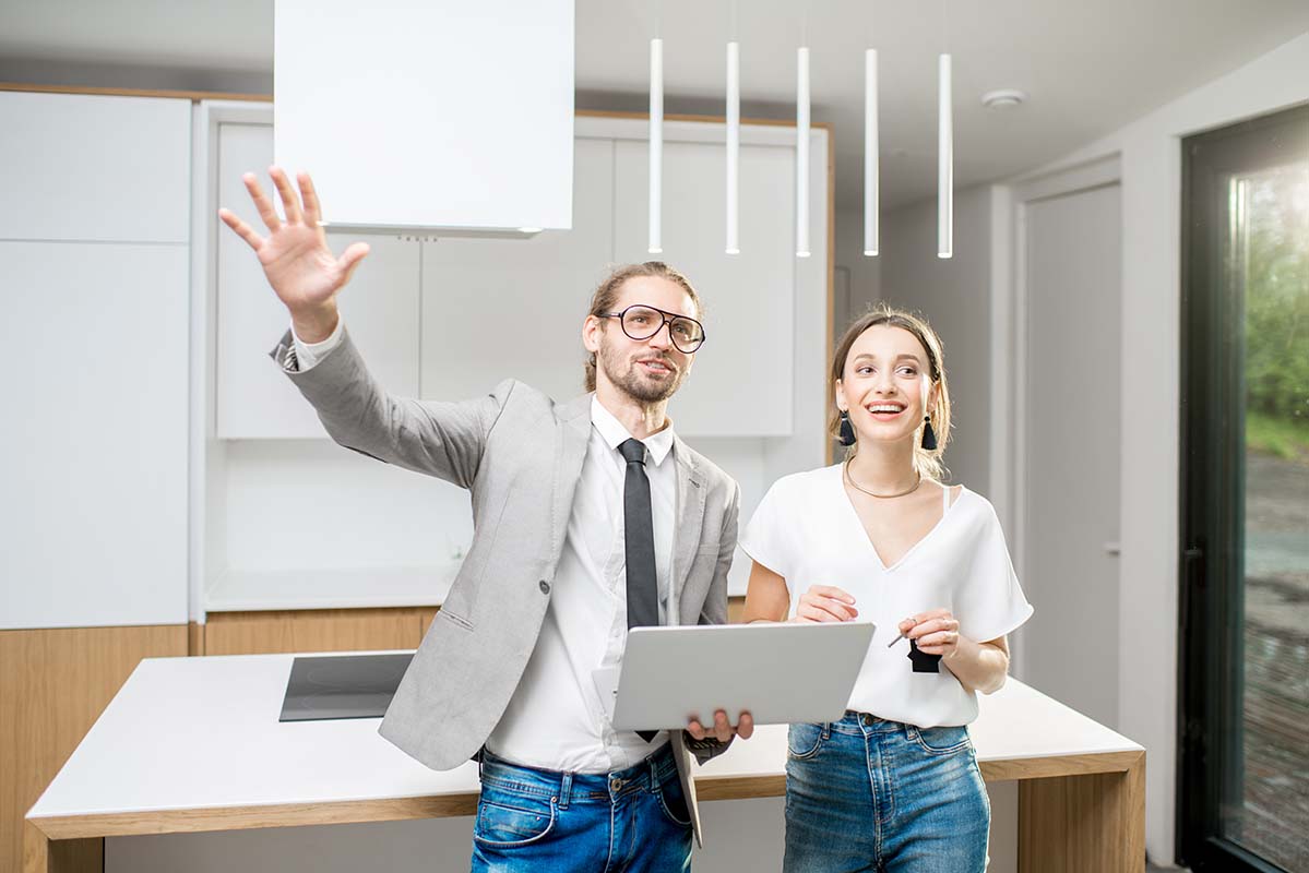 kitchen designer working with female client planning a kitchen