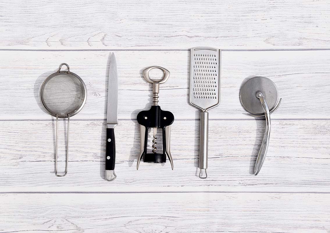 kitchen utensils on wall