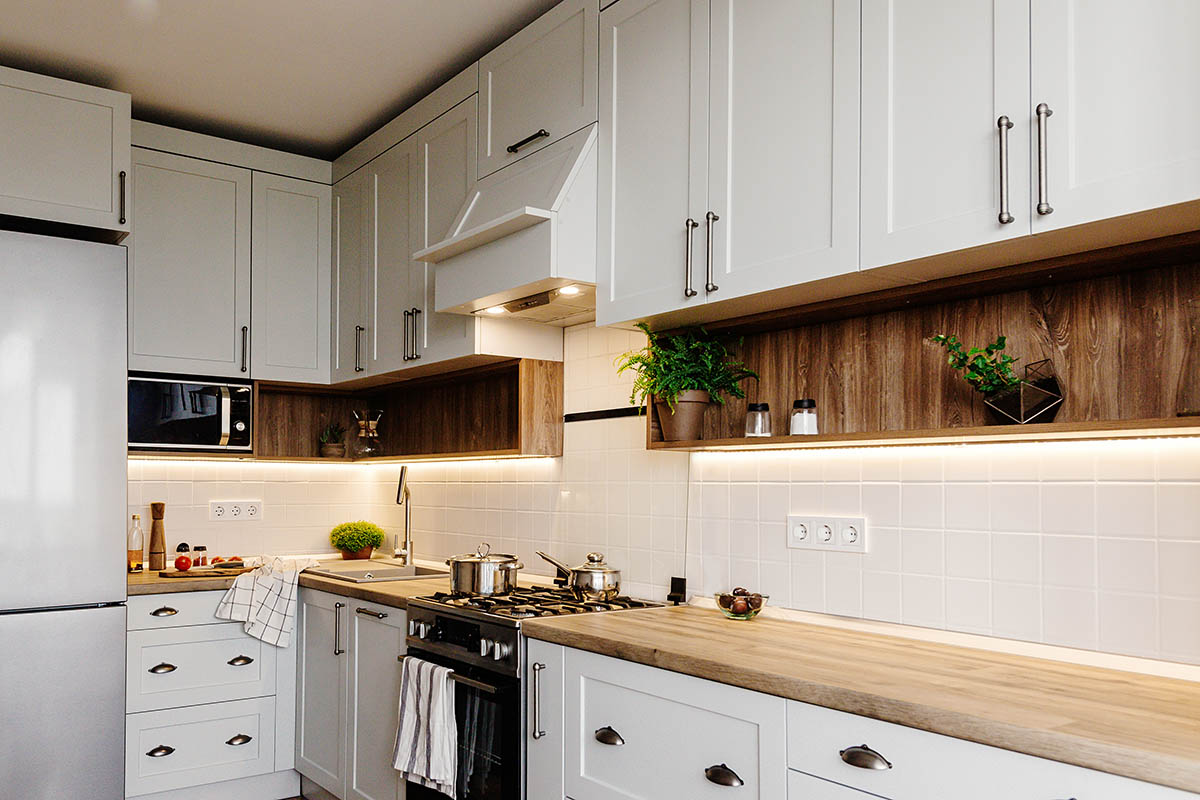 refurbished handmade kitchen cupboards in luxury kitchen