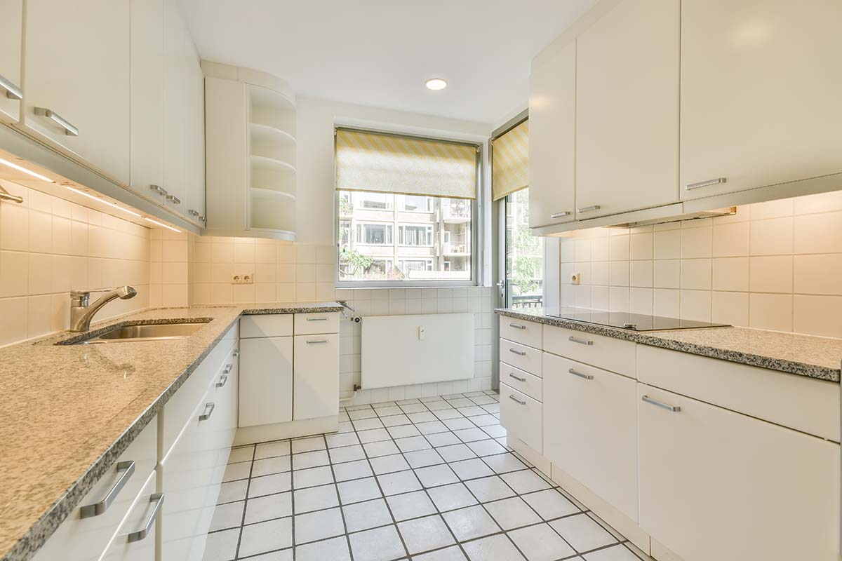 white tiles kitchen floor