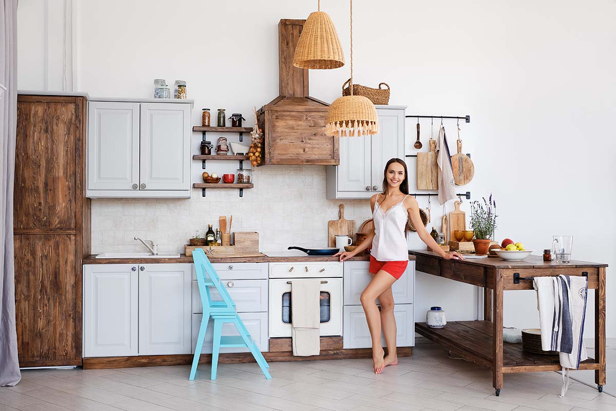 woman standing in a spacious kitchen